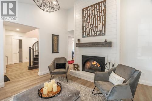 387 Mississagua Street, Niagara-On-The-Lake, ON - Indoor Photo Showing Living Room With Fireplace