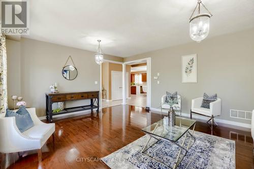 33 Huntspoint Drive, Brampton, ON - Indoor Photo Showing Living Room With Fireplace