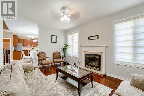 33 Huntspoint Drive, Brampton, ON - Indoor Photo Showing Living Room With Fireplace