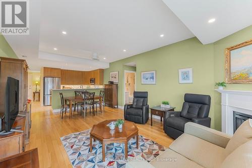 609 - 6 Toronto Street, Barrie, ON - Indoor Photo Showing Living Room With Fireplace