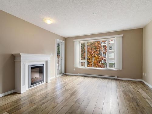 204-2823 Jacklin Rd, Langford, BC - Indoor Photo Showing Living Room With Fireplace