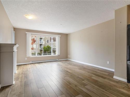 204-2823 Jacklin Rd, Langford, BC - Indoor Photo Showing Living Room With Fireplace