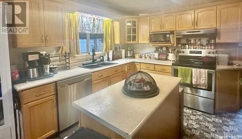 1515 Laronge Avenue, La Ronge, SK - Indoor Photo Showing Kitchen With Double Sink