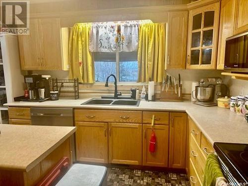 1515 Laronge Avenue, La Ronge, SK - Indoor Photo Showing Kitchen With Double Sink