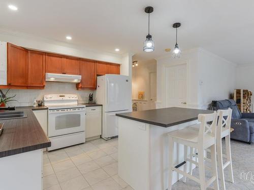 Cuisine - 2206 Ch. Mcgill, Sainte-Julienne, QC - Indoor Photo Showing Kitchen With Double Sink