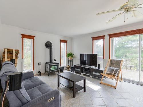 Salon - 2206 Ch. Mcgill, Sainte-Julienne, QC - Indoor Photo Showing Living Room With Fireplace