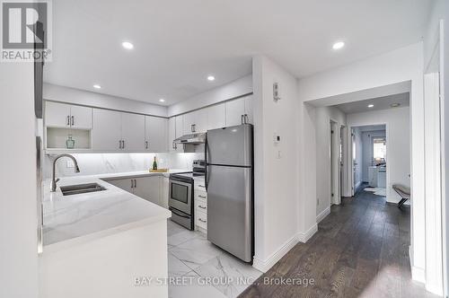 2746 Bur Oak Avenue, Markham, ON - Indoor Photo Showing Kitchen With Double Sink