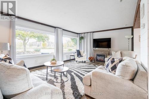 2447 Ridge Road W, Oro-Medonte, ON - Indoor Photo Showing Living Room With Fireplace