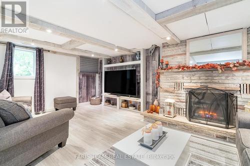 2447 Ridge Road W, Oro-Medonte, ON - Indoor Photo Showing Living Room With Fireplace