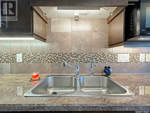 104 4100 Sandhill Crescent, Regina, SK - Indoor Photo Showing Kitchen With Double Sink