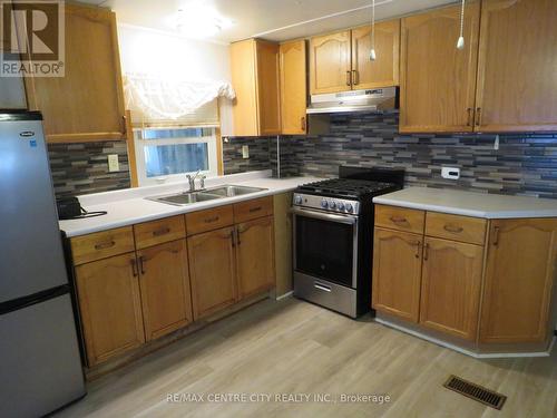 Kitchen - 102 - 2189 Dundas Street E, London, ON - Indoor Photo Showing Kitchen With Double Sink