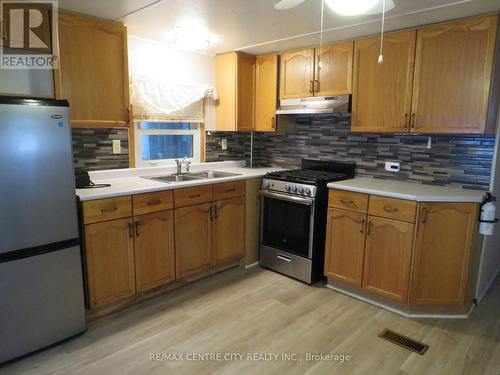 102 - 2189 Dundas Street E, London, ON - Indoor Photo Showing Kitchen With Double Sink