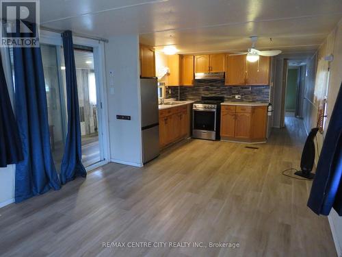 kitchen/livingroom, patio doors to porch - 102 - 2189 Dundas Street E, London, ON - Indoor Photo Showing Kitchen