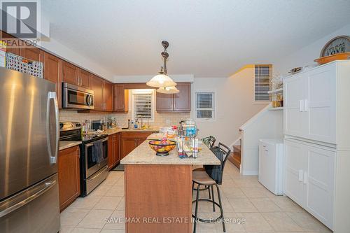 15 Eliza Avenue N, Kitchener, ON - Indoor Photo Showing Kitchen With Double Sink