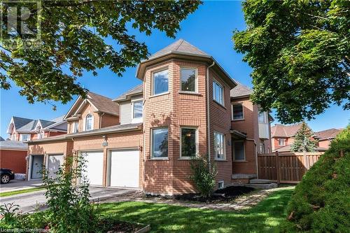 View of front facade with a garage and a front yard - 139 Shady Pine Circle, Brampton, ON - Outdoor With Facade