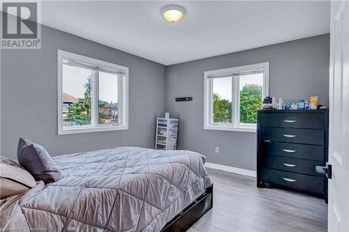 Bedroom with wood-type flooring and a textured ceiling - 139 Shady Pine Circle, Brampton, ON - Indoor Photo Showing Bedroom