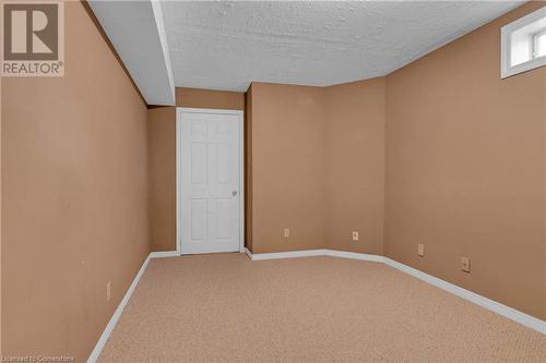 Spare room with a textured ceiling and carpet flooring - 139 Shady Pine Circle, Brampton, ON - Indoor Photo Showing Other Room