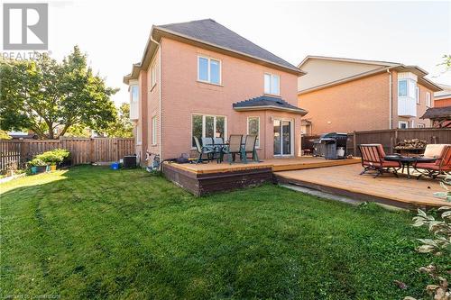 Back of property featuring central air condition unit, a yard, and a deck - 139 Shady Pine Circle, Brampton, ON - Outdoor With Deck Patio Veranda With Exterior