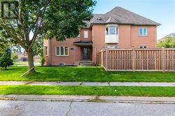 View of front of house with a front yard - 