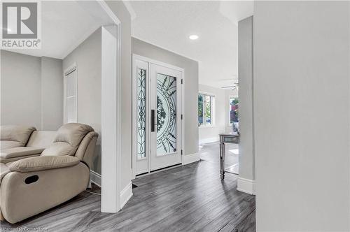 Foyer featuring hardwood / wood-style flooring and ceiling fan - 139 Shady Pine Circle, Brampton, ON - Indoor Photo Showing Other Room