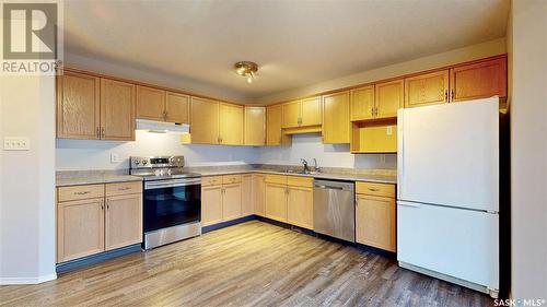 5177 Donnelly Crescent, Regina, SK - Indoor Photo Showing Kitchen With Double Sink