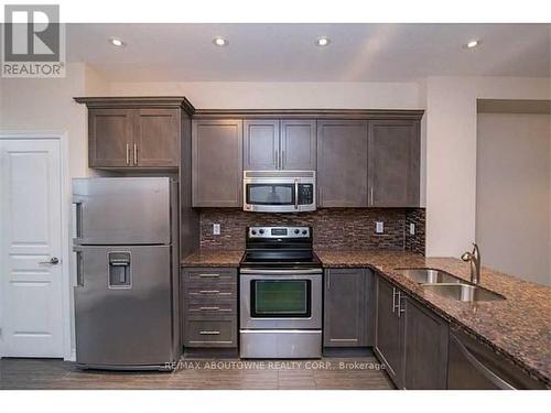 63 - 541 Winston Road, Grimsby, ON - Indoor Photo Showing Kitchen With Double Sink