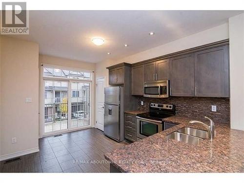 63 - 541 Winston Road, Grimsby, ON - Indoor Photo Showing Kitchen With Double Sink With Upgraded Kitchen