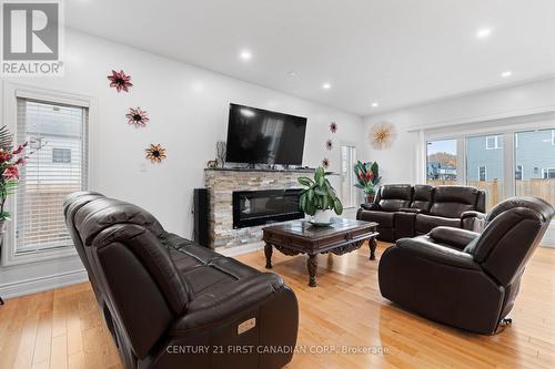 2951 Heardcreek Trail, London, ON - Indoor Photo Showing Living Room With Fireplace