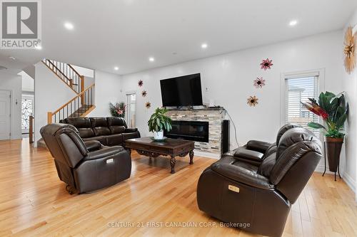 2951 Heardcreek Trail, London, ON - Indoor Photo Showing Living Room With Fireplace