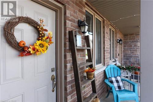 Entrance to property with covered porch - 135 Samuel Drive, Arthur, ON 