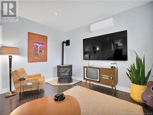 9 Larsen Lane, Salisbury, NB - Indoor Photo Showing Living Room With Fireplace