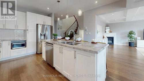 115 Roy Nichols Drive, Clarington, ON - Indoor Photo Showing Kitchen With Fireplace With Double Sink With Upgraded Kitchen