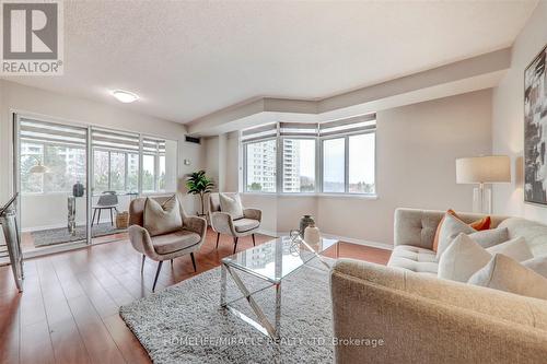 409 - 88 Alton Towers Circle, Toronto, ON - Indoor Photo Showing Living Room