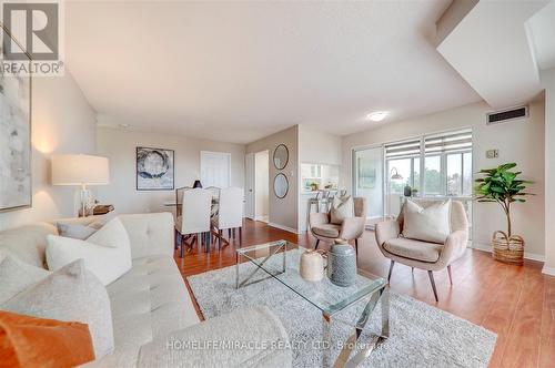 409 - 88 Alton Towers Circle, Toronto, ON - Indoor Photo Showing Living Room