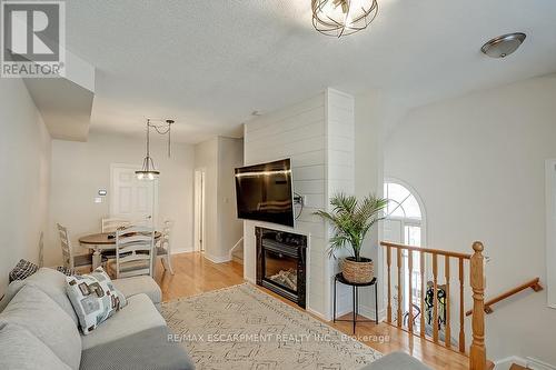 59 - 1169 Dorval Drive, Oakville, ON - Indoor Photo Showing Living Room With Fireplace