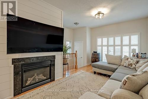 59 - 1169 Dorval Drive, Oakville, ON - Indoor Photo Showing Living Room With Fireplace