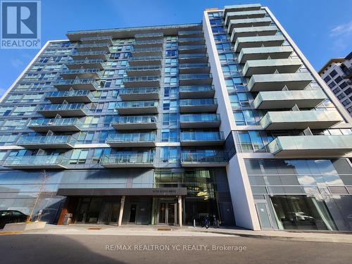 411 - 10 De Boers Drive, Toronto, ON - Outdoor With Balcony With Facade