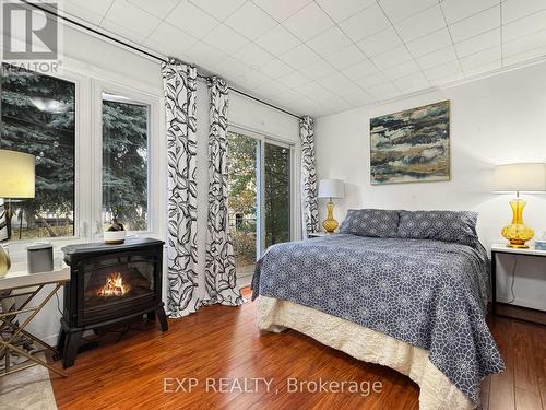 1089 Meredith Avenue, Mississauga, ON - Indoor Photo Showing Bedroom With Fireplace