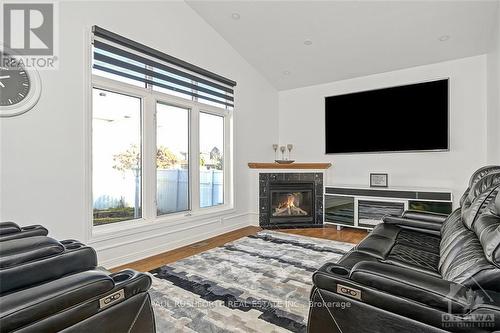 1123 Lichen Avenue, Ottawa, ON - Indoor Photo Showing Living Room With Fireplace