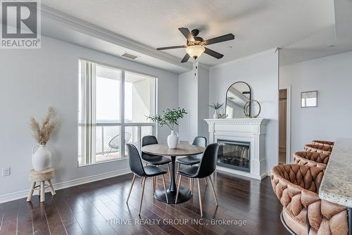 904 - 330 Ridout Street N, London, ON - Indoor Photo Showing Dining Room With Fireplace