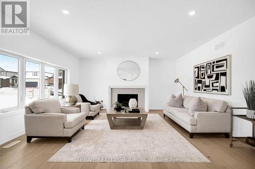 3 Basil Crescent, Middlesex Centre (Ilderton), ON - Indoor Photo Showing Living Room With Fireplace