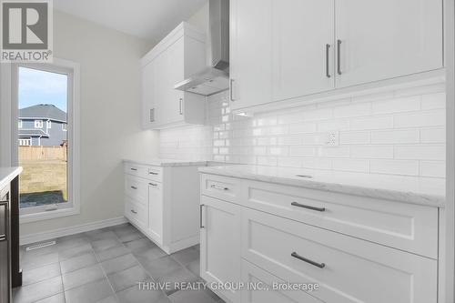 64 Basil Crescent, Middlesex Centre (Ilderton), ON - Indoor Photo Showing Kitchen