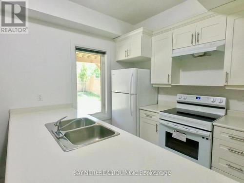 Bsmt - 2 Greenwich Street, Barrie, ON - Indoor Photo Showing Kitchen With Double Sink