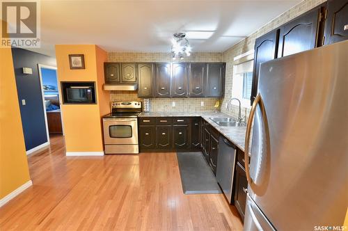 1418 Latrace Road, Saskatoon, SK - Indoor Photo Showing Kitchen With Double Sink