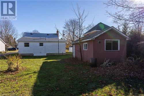 Back of house with an outdoor structure and a yard - 1710 7Th Avenue E, Owen Sound, ON - Outdoor