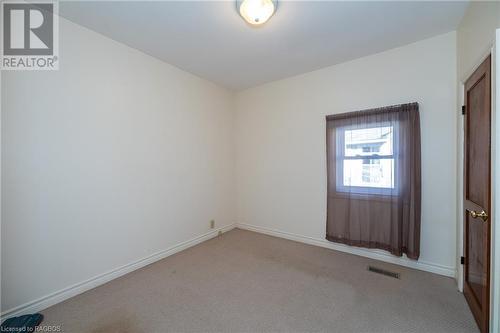 Unfurnished room with light colored carpet - 1710 7Th Avenue E, Owen Sound, ON - Indoor Photo Showing Other Room