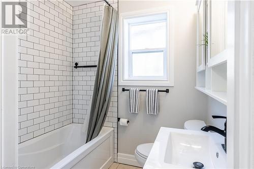 Full bathroom with sink, toilet, and shower / tub combo with curtain - 645 Weber Street E, Kitchener, ON - Indoor Photo Showing Bathroom