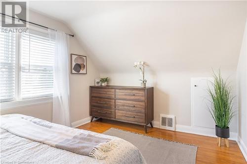 Bedroom with light wood-type flooring and vaulted ceiling - 645 Weber Street E, Kitchener, ON - Indoor Photo Showing Bedroom