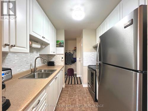 515 - 358 Queen Mary Road, Kingston (West Of Sir John A. Blvd), ON - Indoor Photo Showing Kitchen With Stainless Steel Kitchen With Double Sink