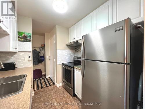 515 - 358 Queen Mary Road, Kingston (West Of Sir John A. Blvd), ON - Indoor Photo Showing Kitchen With Stainless Steel Kitchen With Double Sink